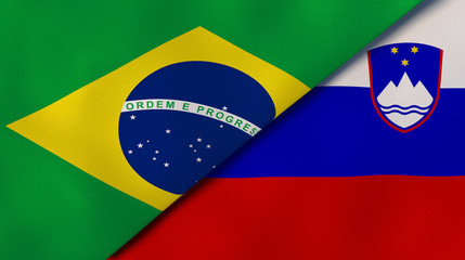 The flags of Brazil and Slovenia. News, reportage, business background. 3d illustration