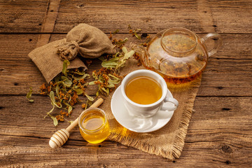 Linden tea. Dry fragrant flowers. Sunny morning breakfast. Hot drink to strengthen the immune system, alternative medicine
