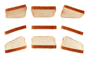 Slices of toast flying isolated on white