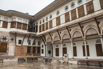 Fototapeta na wymiar The inner courtyard of the Topkapi Palace Harem in Istanbul in rainy weather. Turkey