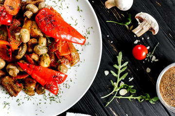 Grilled vegetables with mushrooms and meat. Flat lay
