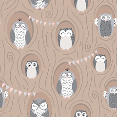 Cute vector pattern with owls in burrows in a tree