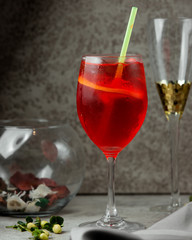 red iced cocktail on the table