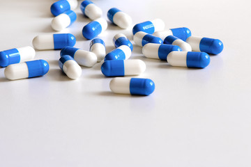 Pain medicine. Capsules of an anti-inflammatory drug are on the table.