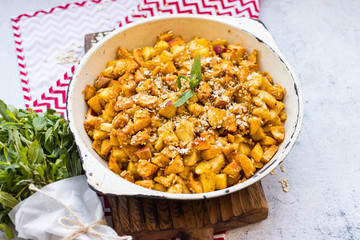 Cinnamon apples baked in pan. Sweet vegan dessert.