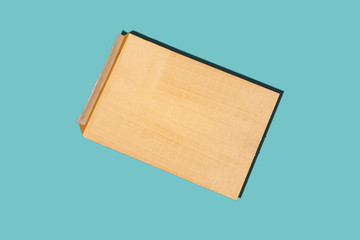 brown envelope mock-up, blank template isolated on blue