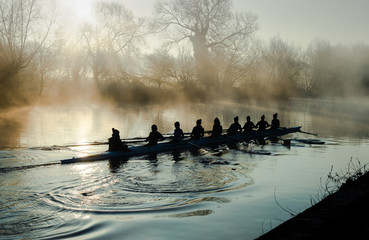 Rowing in early morning mist