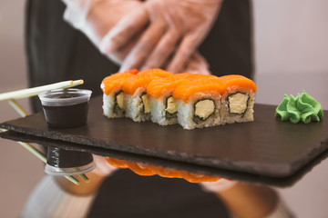 Classic roll philadelphia on black slate plate