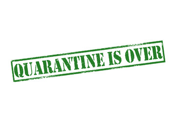 QUARANTINE IS OVER green grunge rubber stamp over a white background