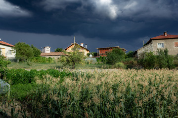 Ominous dark sky with sunshine