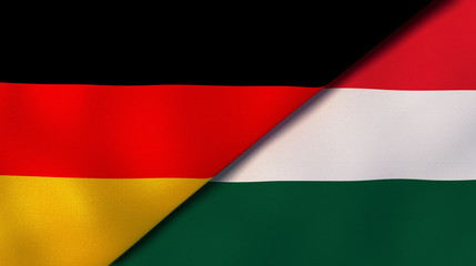 The flags of Germany and Hungary. News, reportage, business background. 3d illustration