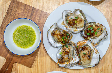 Grilled Oysters with butter and Thai Seafood Dipping Sauce