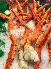 Close up of king crab legs on ice