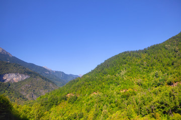 green mountain canyon scenery and blue sky
