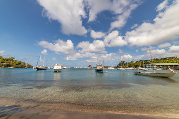 Fototapeta premium Saint Vincent and the Grenadines, boats on mooring in Blue Lagoon