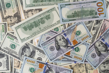 Background with money of american hundred dollar and other notes.