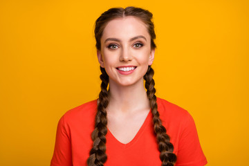 Closeup photo of pretty attractive cheerful lady two cute long braids good mood beaming smile wear...