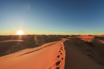 Fototapeta na wymiar Sunset in the Sahara desert, Morocco.