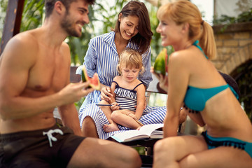 Babysitter with girl in nature