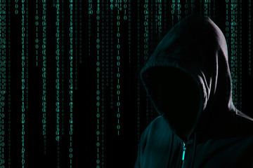 Hacker and digital binary code on dark background. Cyber crime concept