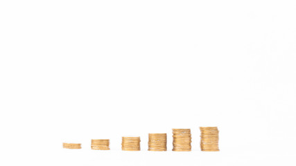 Golden coins stacks on white background