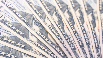 Background of 50 dollar bills. Image with high resolution and soft focus