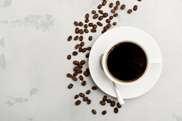 cup of black coffee on a light background