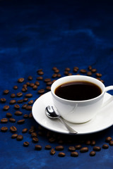 hot black coffee on a blue background