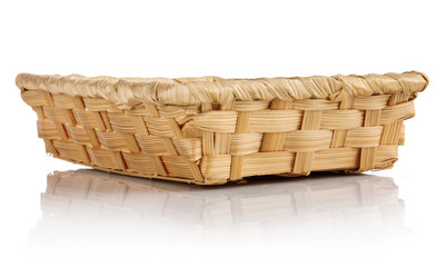 Wicker hollow basket. Kitchen utensils for bread. Isolated on white background.
