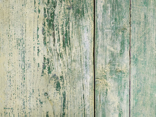 Fototapeta na wymiar Boards wall flat texture grunge background green photo gray sun-burnt old wooden closeup macro