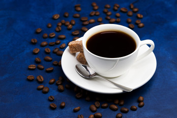 hot black coffee on a blue background