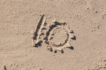 10 written on beach sand