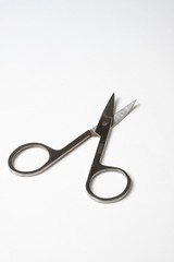 small scissors on a white background