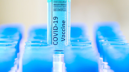 The closer look of the coronavirus vaccine COVID-19 syringe