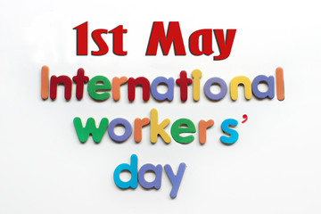 International workers' day text in multi color on white background. Labor day concept sign. International workers' day text written on white background. 1st May