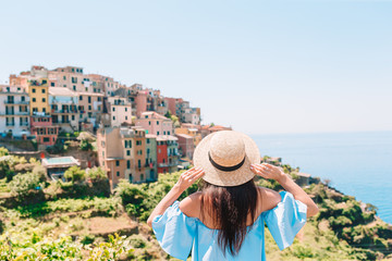 Fototapeta premium Tourist looking at scenic view of Manarola, Cinque Terre, Liguria, Italy