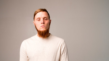 Isolated shot of young handsome male with beard