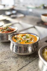 traditional Indian dishes standing in the restaurant