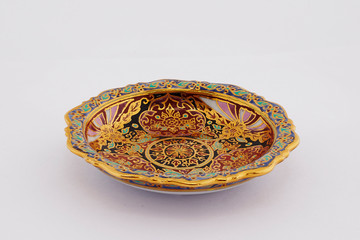 earthenware pottery made of clay fired to a porous state that can be made impervious to liquids by the use of a glaze.
