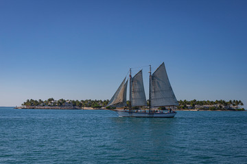 Fototapeta premium Sailboat in the caribbean sea. Islands of the Caribbean.