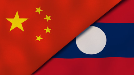 The flags of China and Laos. News, reportage, business background. 3d illustration