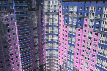 high-rise building of creative color, pink and blue colors, multi-storey 
