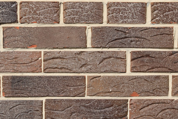 Brown background of beautiful unusual building brick