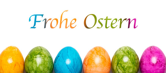 Border of easter eggs in different colors with text Happy Easter in German on white background