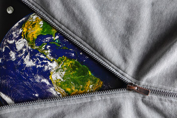 View of the planet the Earth and the Moon when we unfasten the gray metal zipper clasp