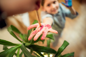 person holding a lily
