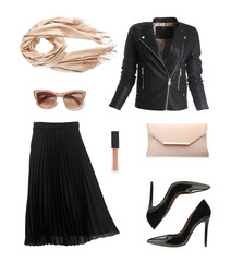 Set of stylish female clothes and accessories on white background