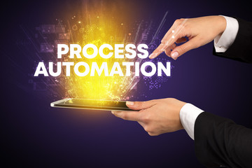 Close-up of a touchscreen with PROCESS AUTOMATION inscription, innovative technology concept