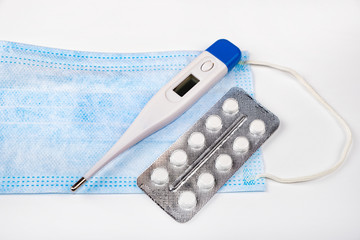 Flu Mask with a Thermometer