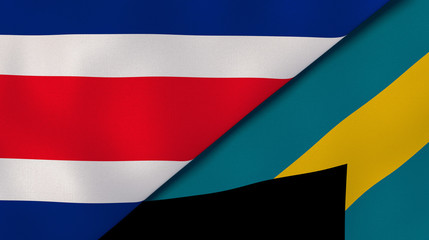 The flags of Costa Rica and Bahamas. News, reportage, business background. 3d illustration